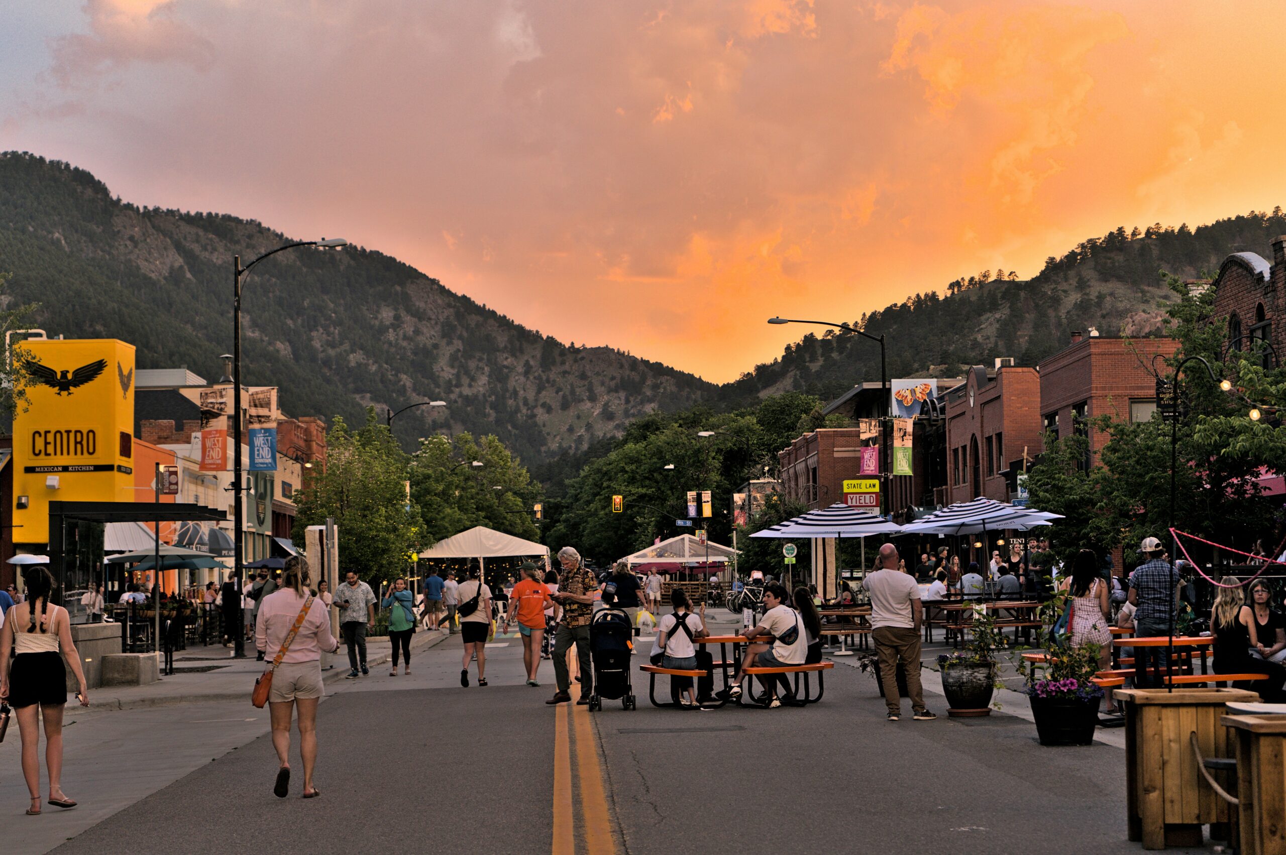 Boulder downtown with people at table
