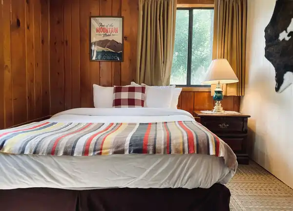 King Bed with Lamp and Poster